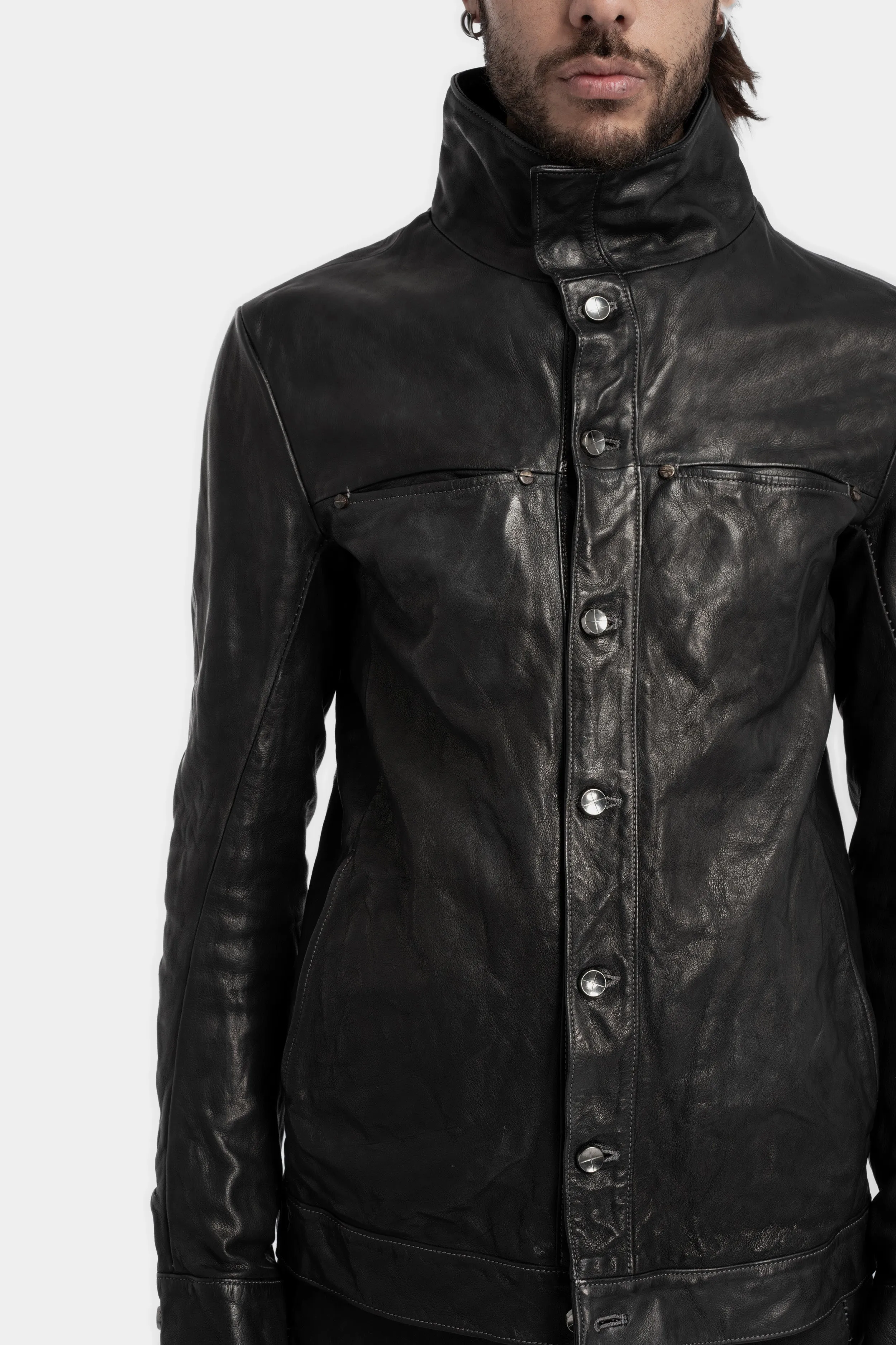 Buttoned leather over shirt