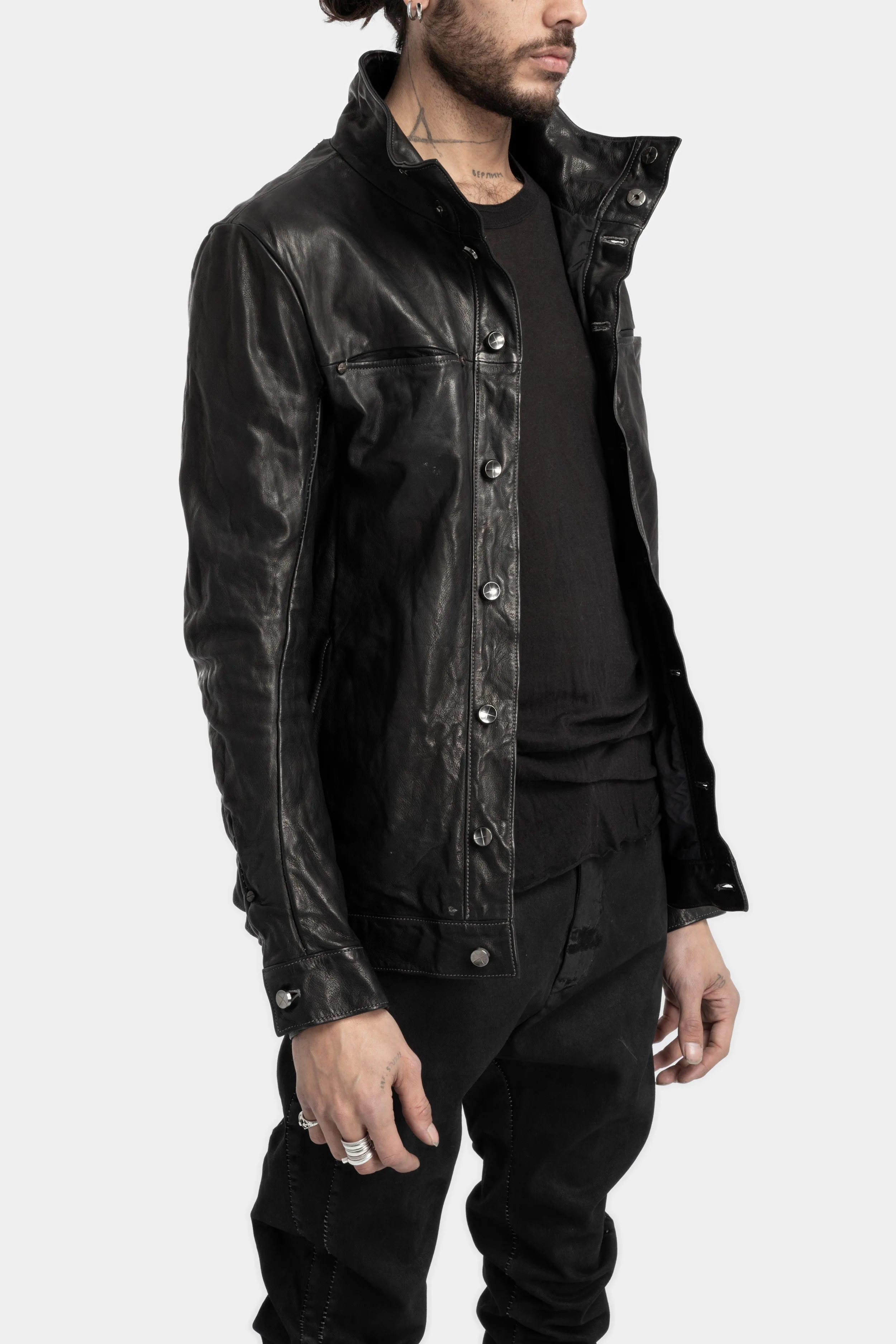 Buttoned leather over shirt